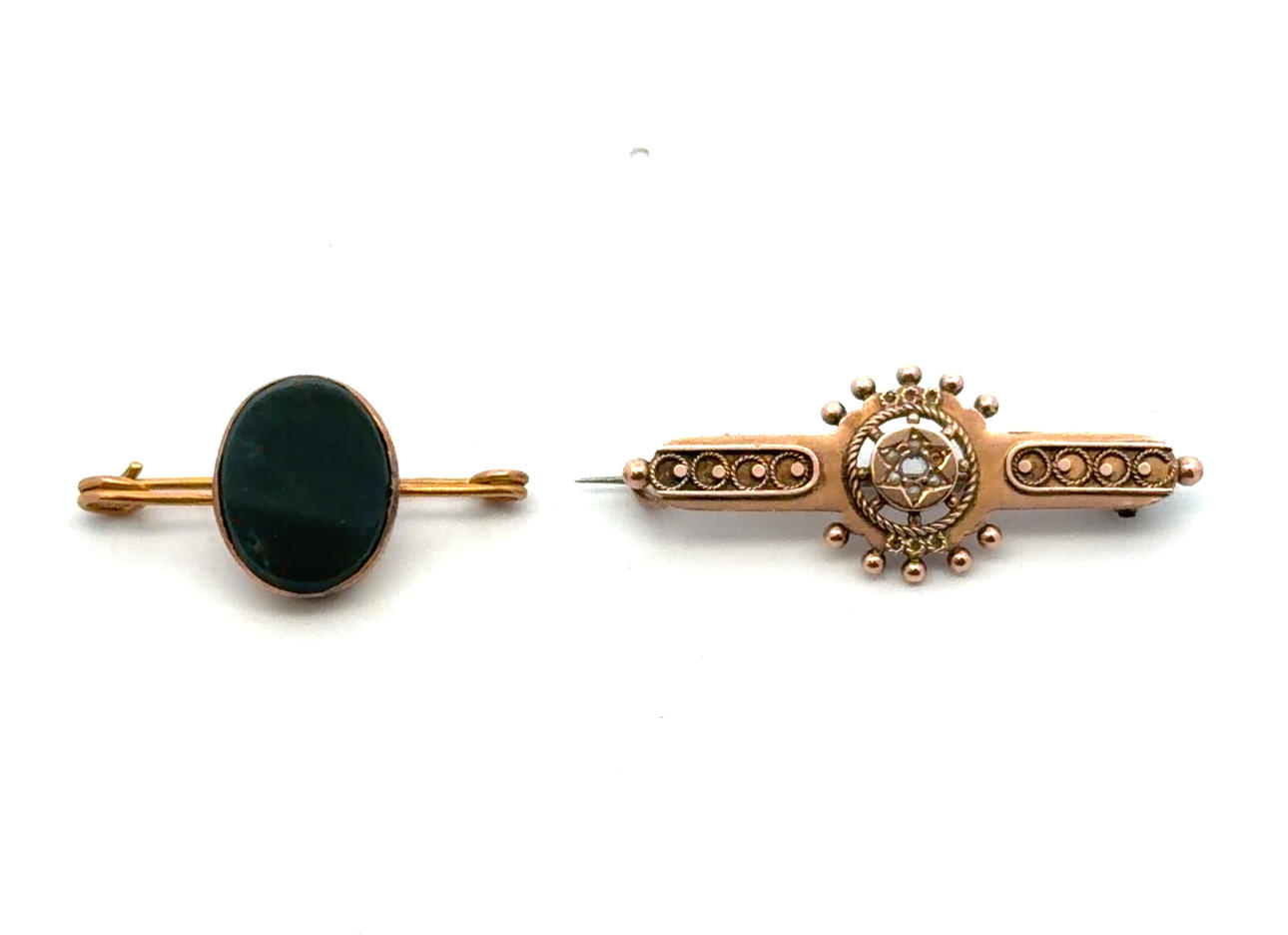 TWO 9CT GOLD BROOCHES.