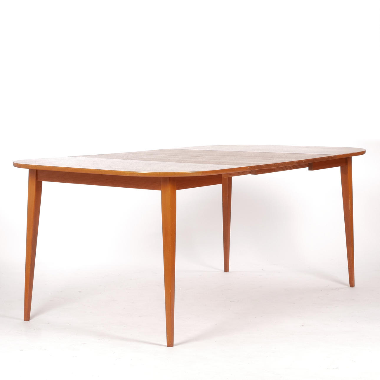DINING TABLE, 2 extension leaves, teak veneer, 1950s.