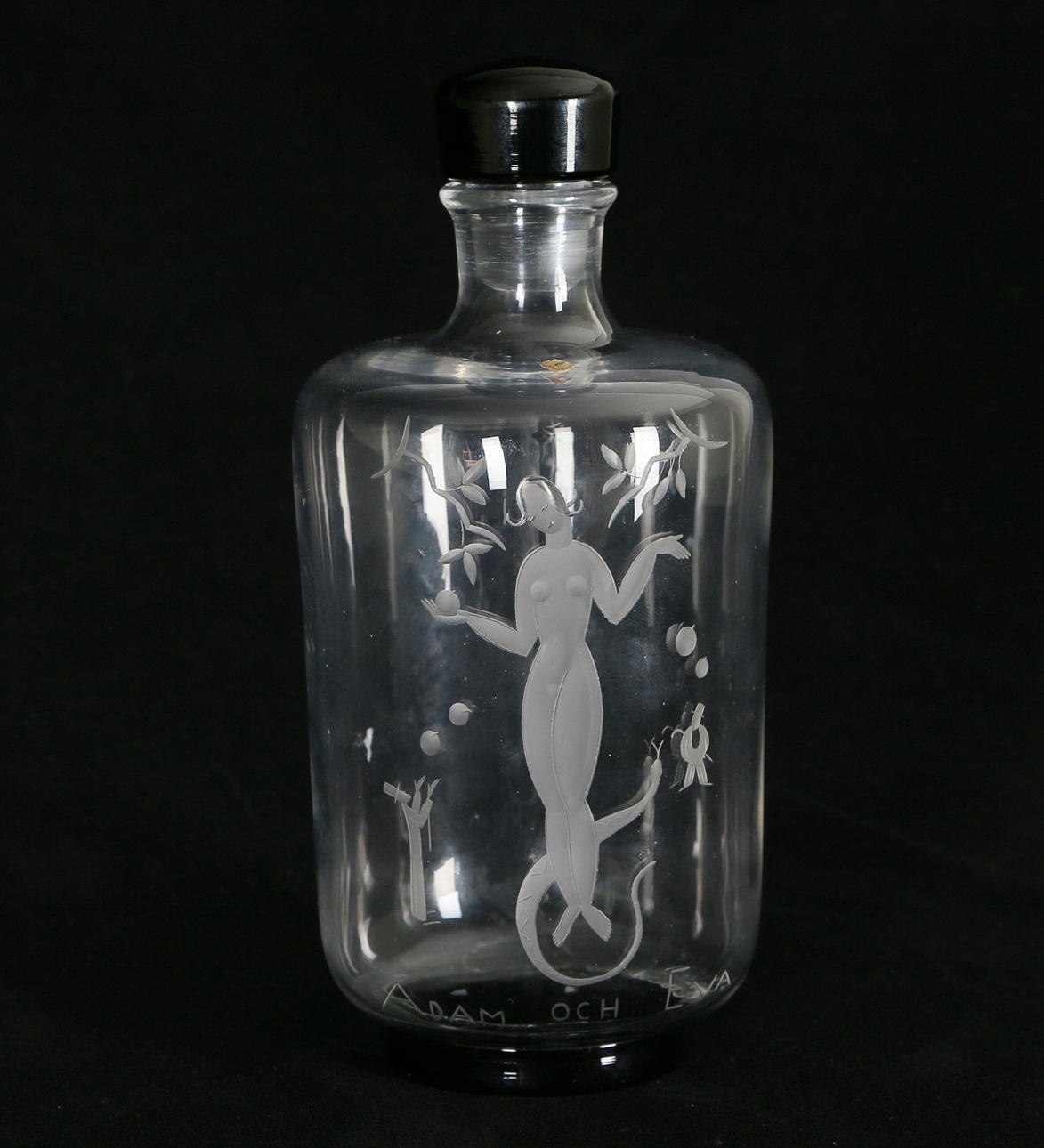 EDWARD HALD. CARAFE with black stopper, glass, Adam and Eva, Orrefors, signed, 1935.