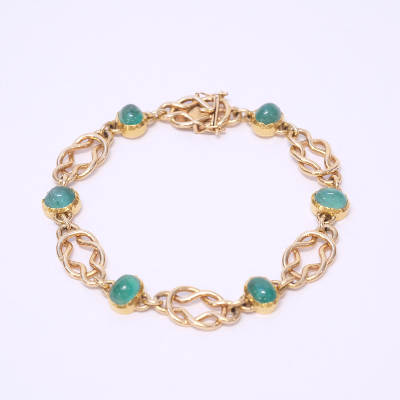 ARMBAND, 18K GULD, CABOCHONSLIPADE SMARAGDER.