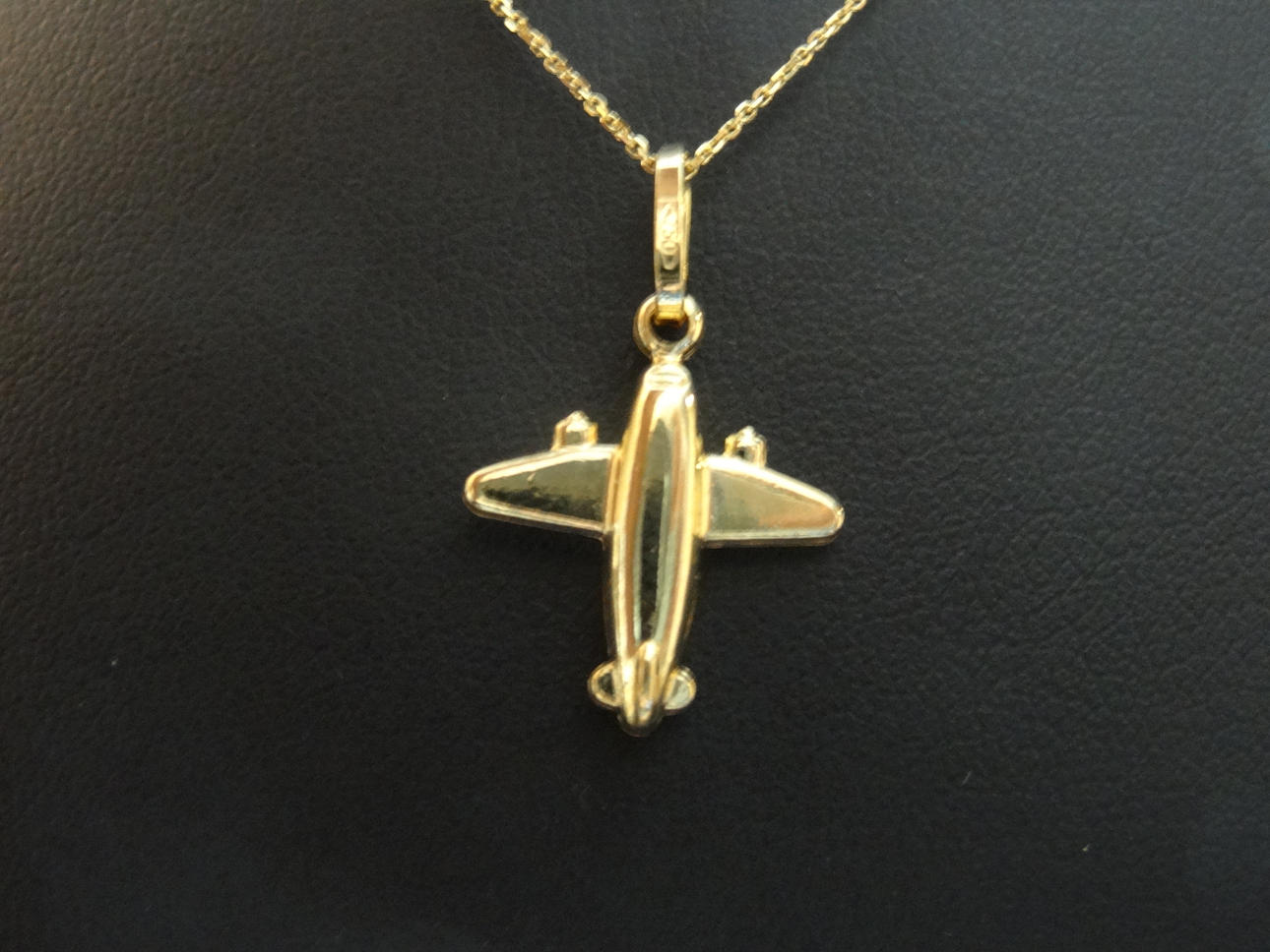 FLUGZEUG Halskette 18 Karat Gold.