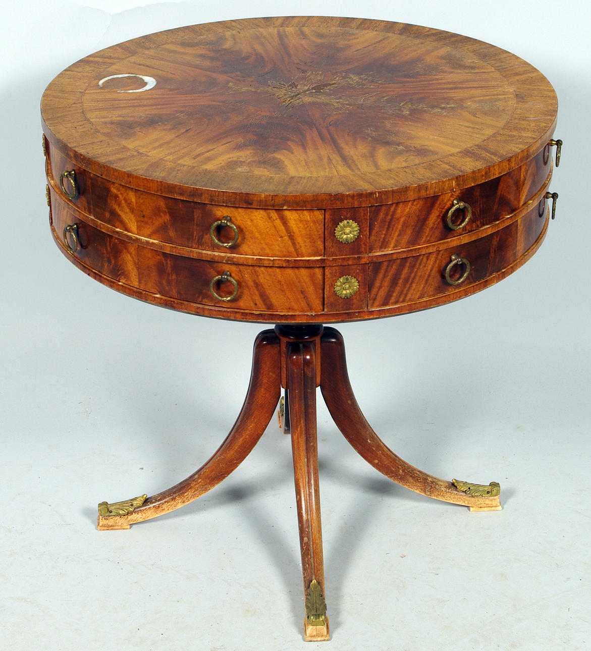 CAROUSEL TABLE with double drawer rows, mahogany.