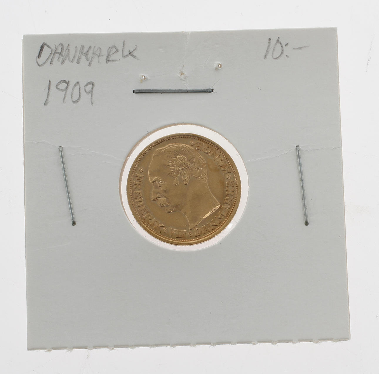 GULDMYNT, 10 kroner Danmark 1909, 21,6k guld. Vikt 4,4 gram.