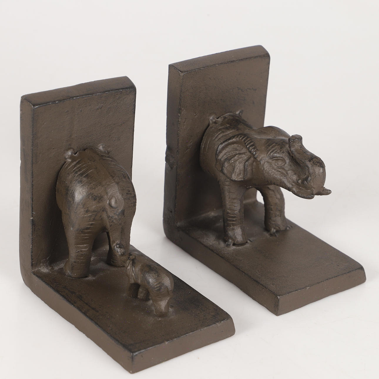 BOKSTÖD, 1 par i form av elefant, metall.