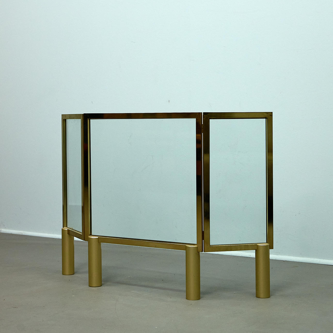 Three-part fire screen, brass and glass, 1970s.