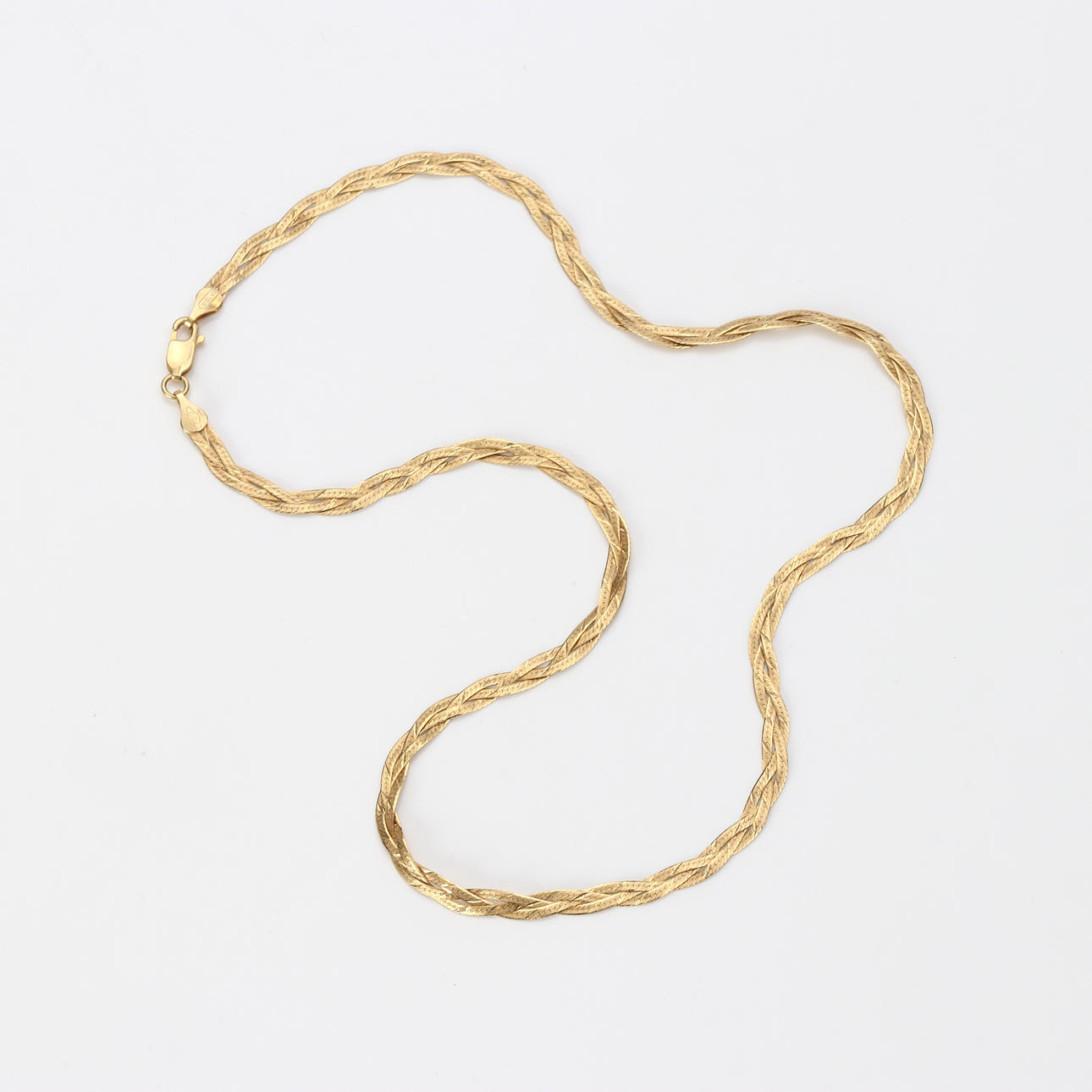 HALSBAND. 18k flätat guld, vikt ca 8,2 gram.