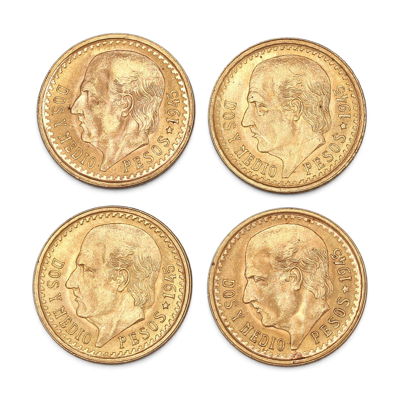 Four Mexican gold coins.