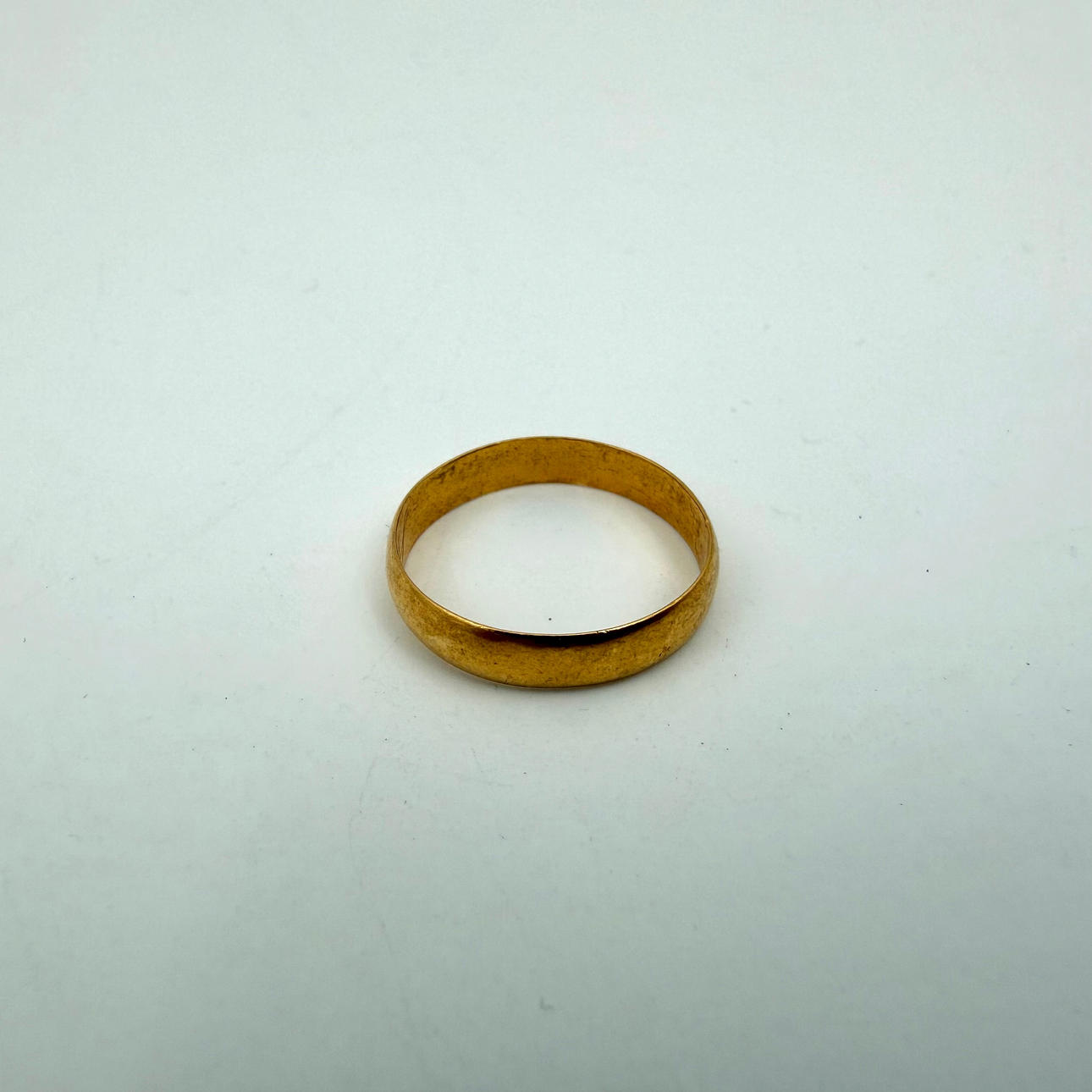 RING, guld 23 k, stämplad för CAB, Stockholm, 1885, vikt ca 3,12 gr.
