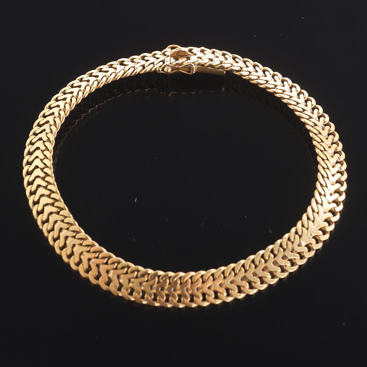 ARMBAND, 18 k guld, "Fiskben".