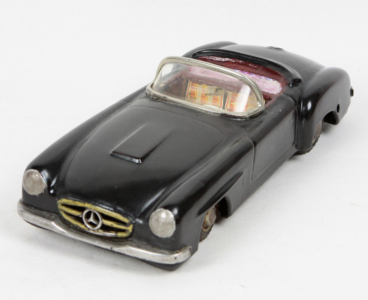 Altes Modellauto, Blech, Mercedes Cabrio, um 1955.