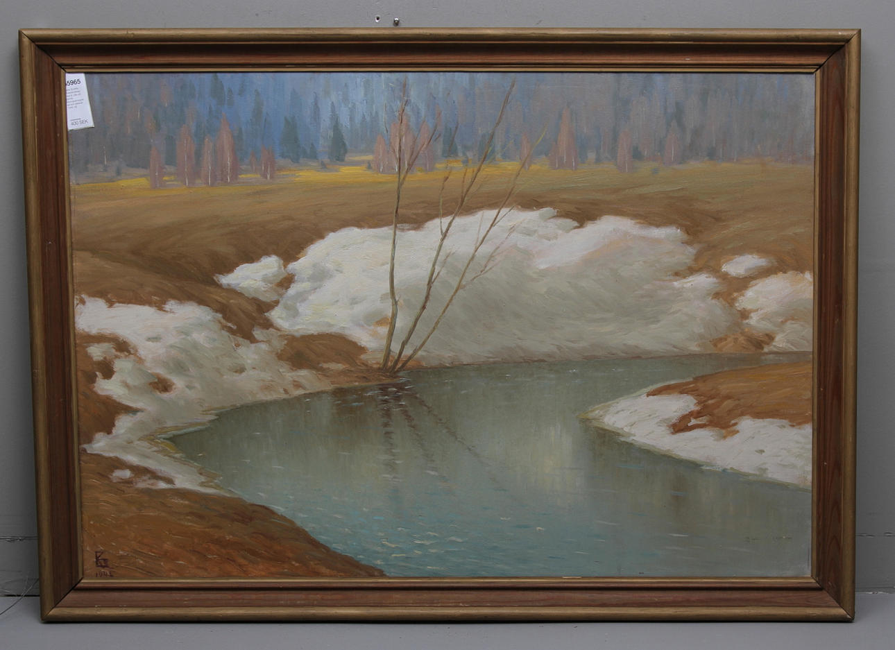 KARL EEWIN. Vinterlandskap med å. Olja på pannå. Monogramsignerad och daterad 1945.