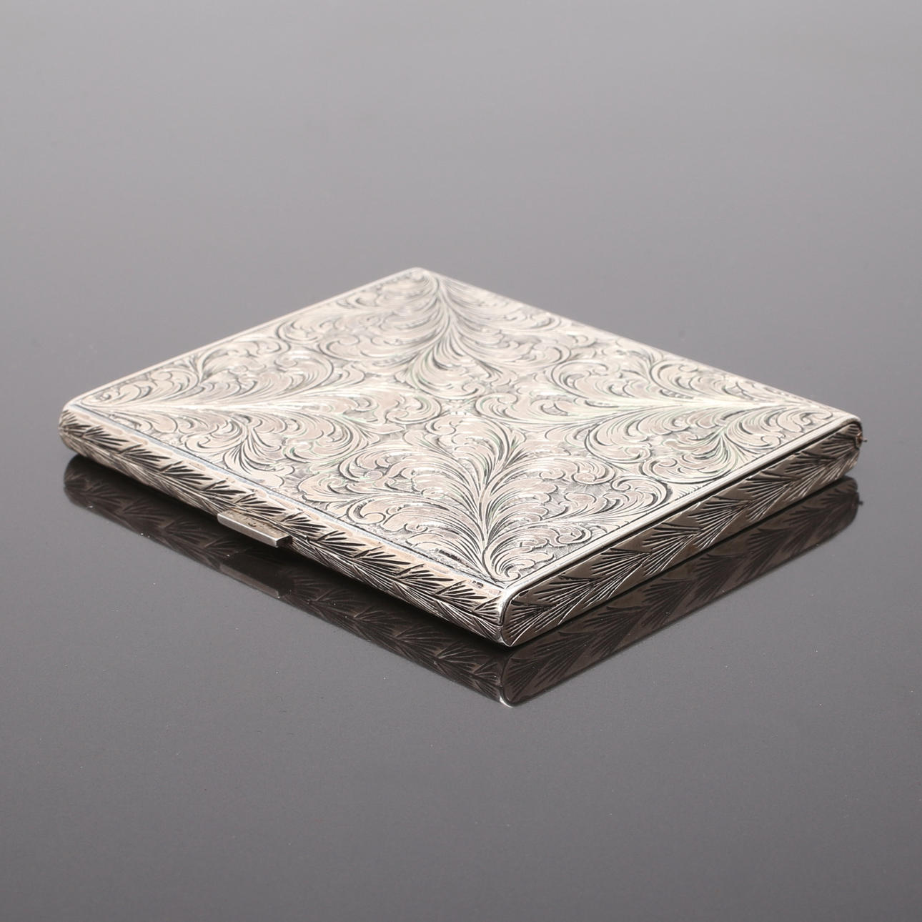 CIGARETTE CASE, silver, foreign stamps, weight 140 grams.