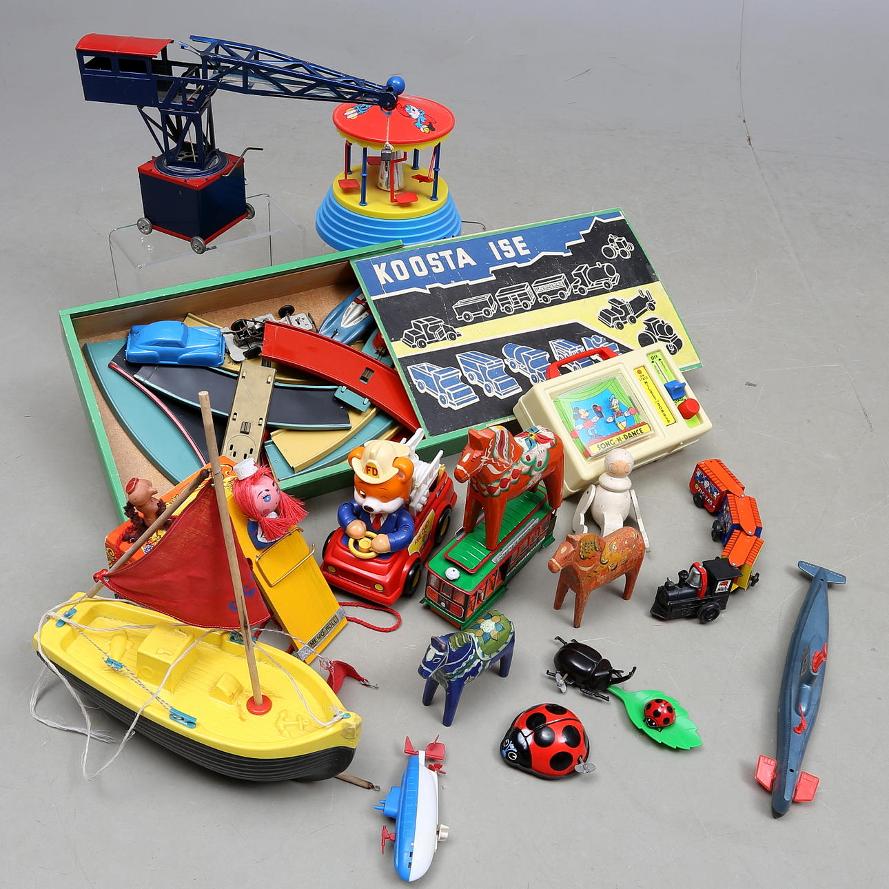 MISCELLANEOUS JOUSTRA crane with clockwork, dancing Donald Duck and Mickey Mouse, tram train and more.
