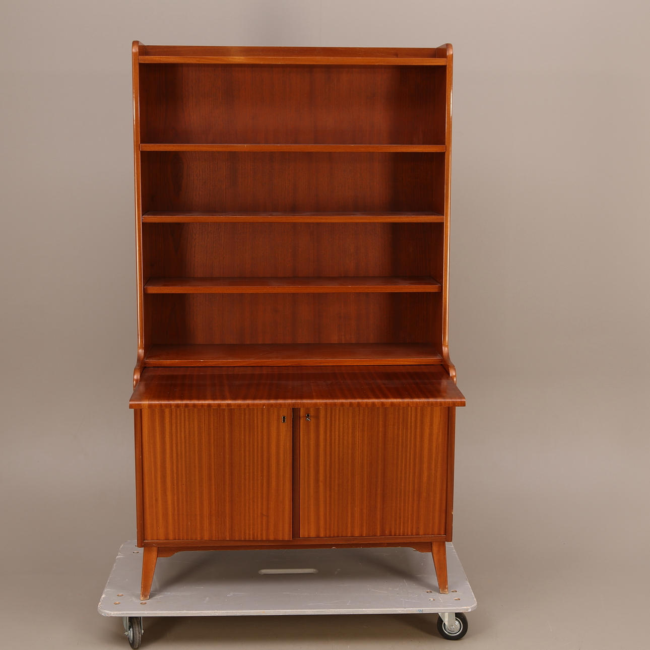 BOOKSHELF with pull-out desk, double doors, 1950s/60s.