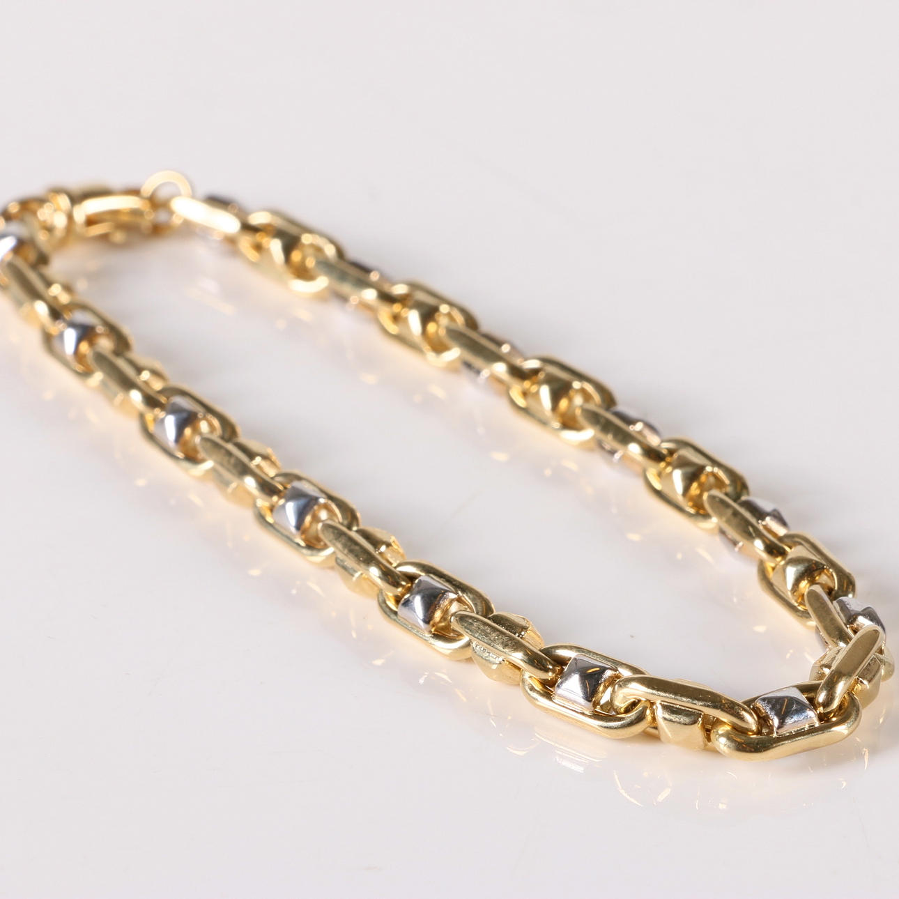 ARMBAND, 18k guld samt vitguld, Hallberg guld, samtida.