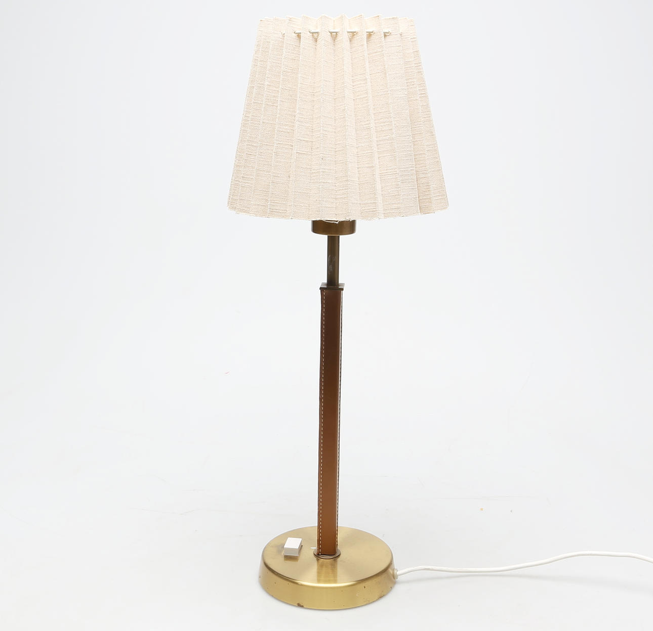 TABLE LAMP, brass and leather, Philips, 1900s.