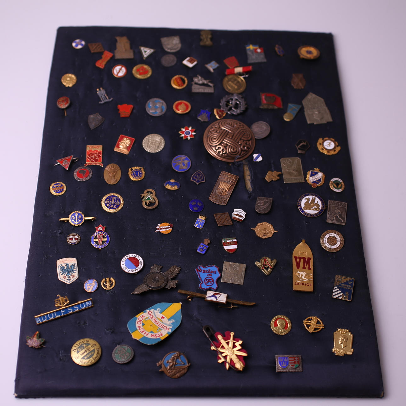 BOARD with MARKS and PINS, 1900s.