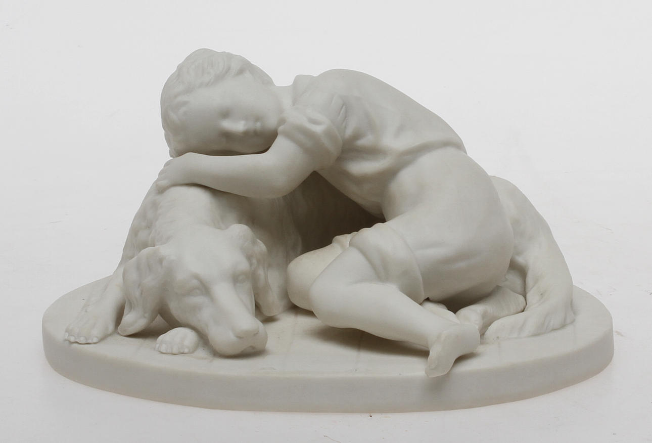 FIGURIN, parian, Hund med pojke, A Rudenschöld, Gustavsberg, daterad 95.