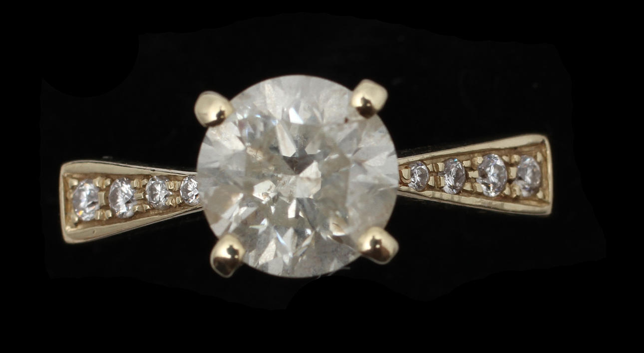 RING, 14 K guld samt briljantslipad diamant, ca totalt 1.25 ct.