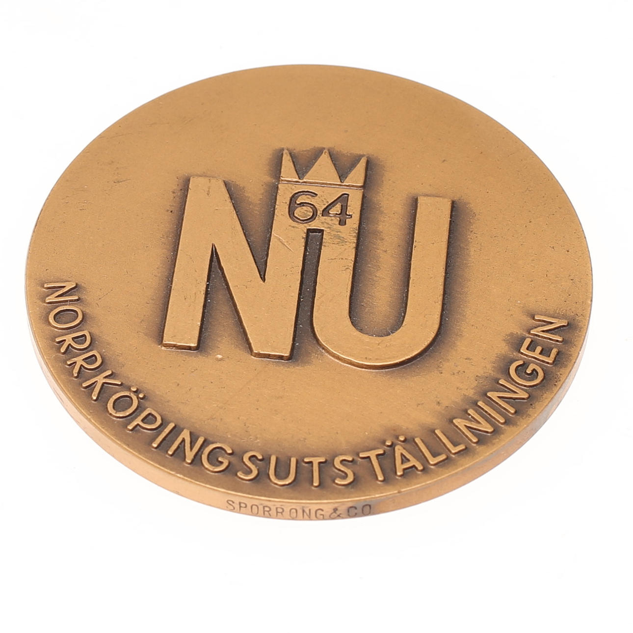 ARNE JONES. Medalla, bronce, exposición NU-64, Norrköping.