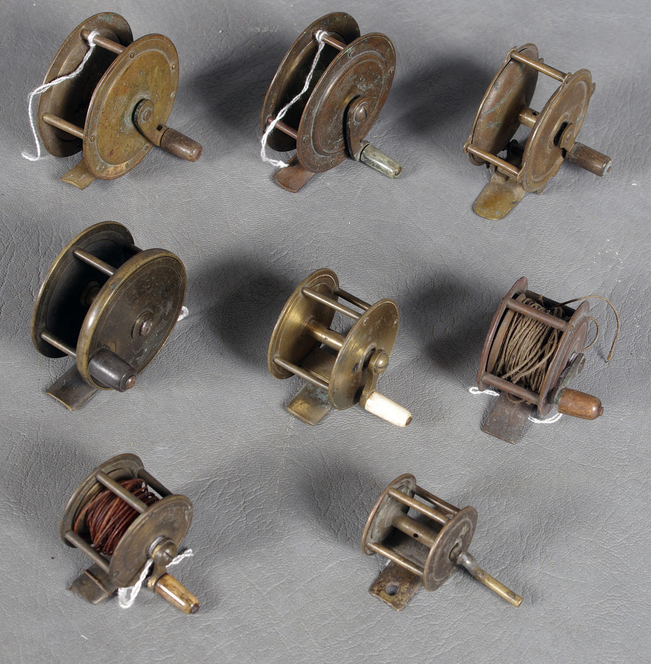 ÄLDRE FLUGFISKERULLAR, metall.