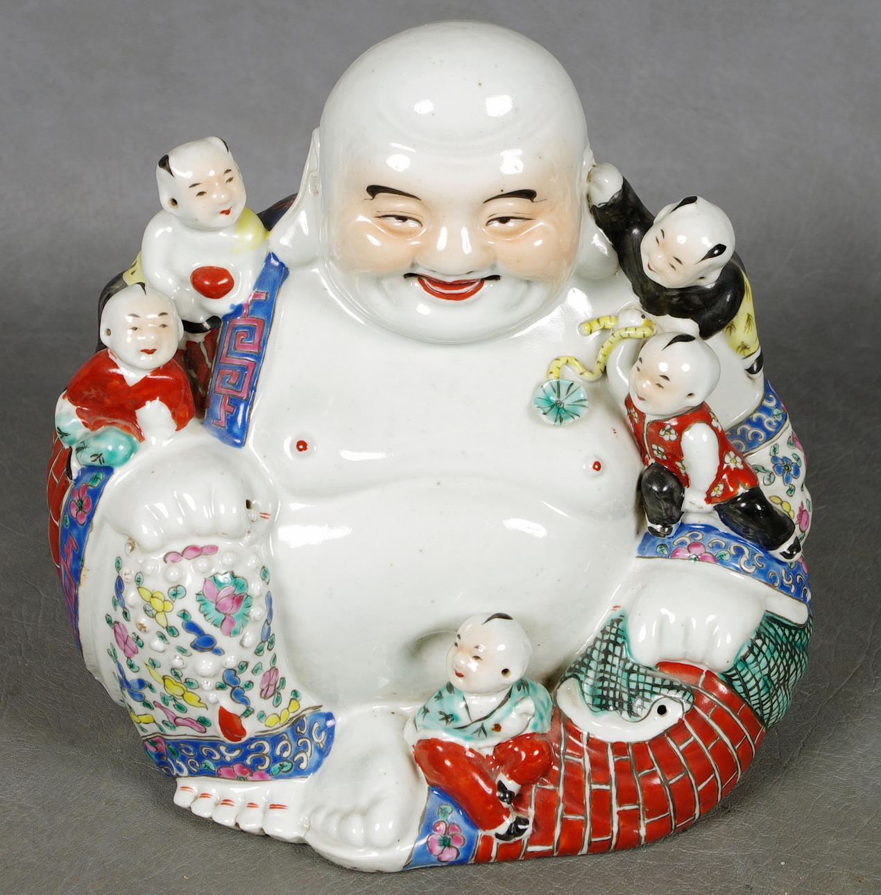 LYCKOGUD, Kina, 1900-tal.