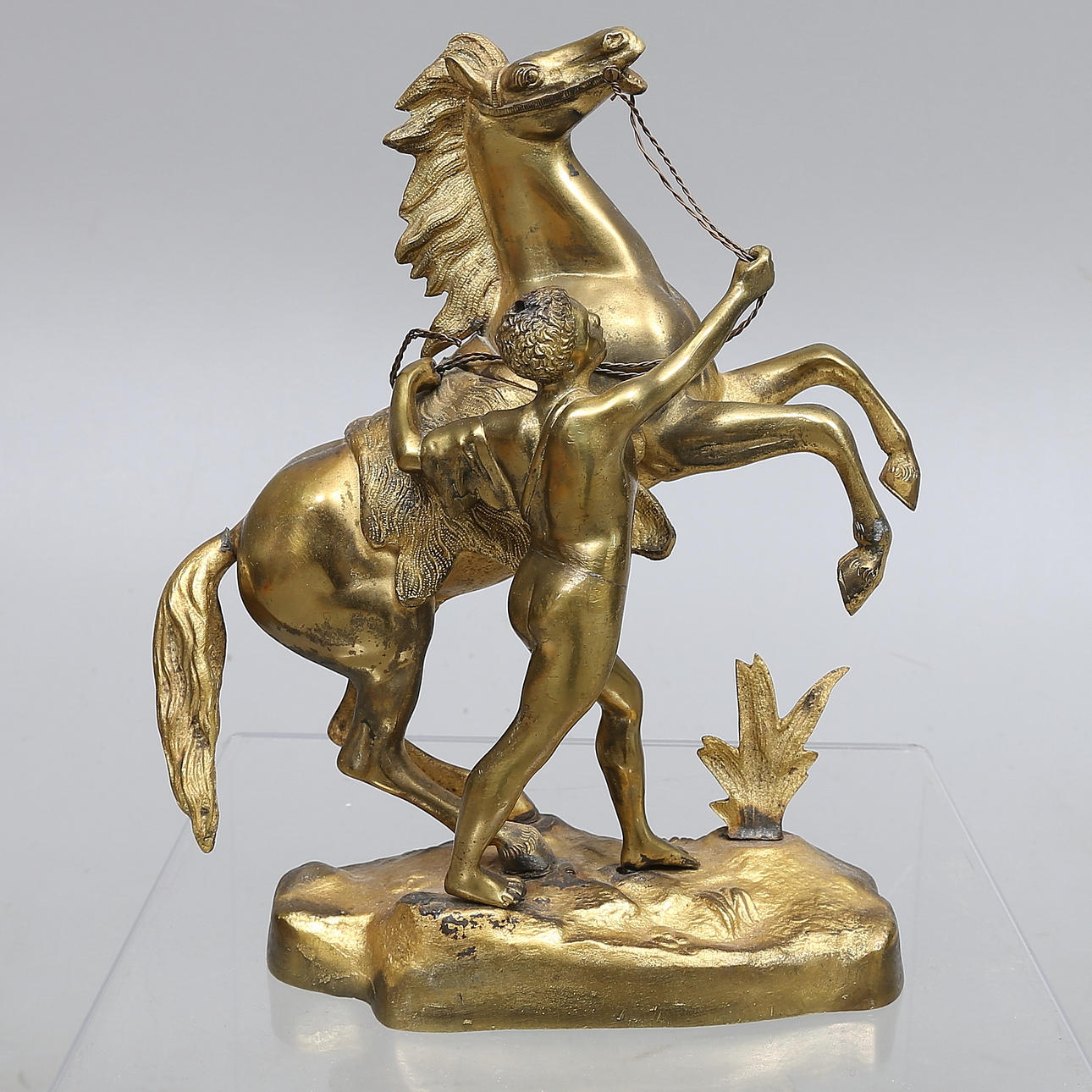 SCULPTURE, brass, man with horse.