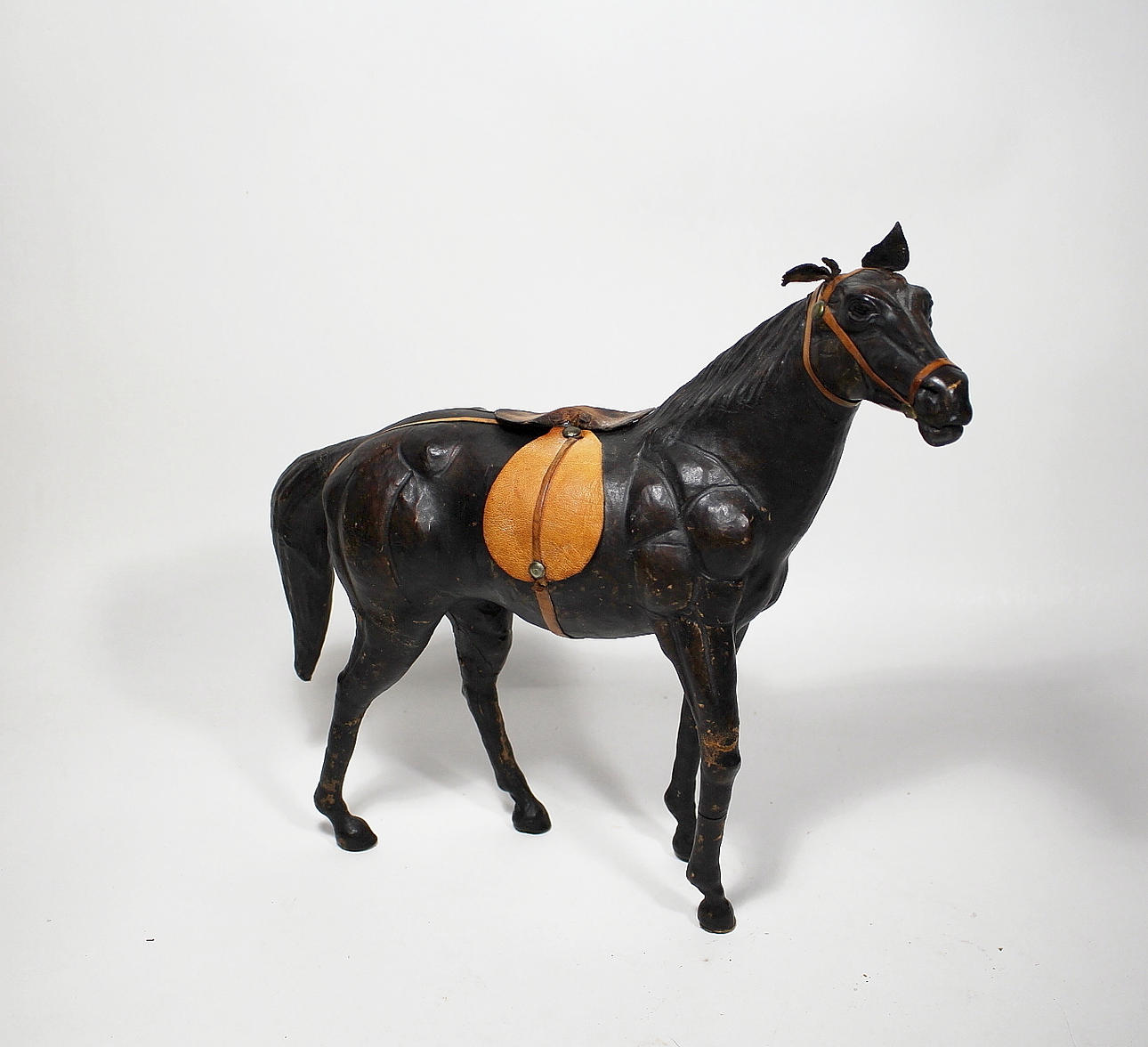 FIGURIN, häst, skinn.