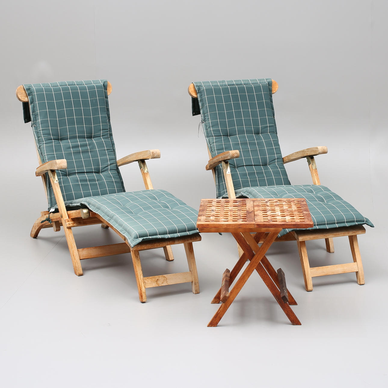 DECK CHAIRS, a pair, and TABLE, teak, Mellby Garden, 2000s.