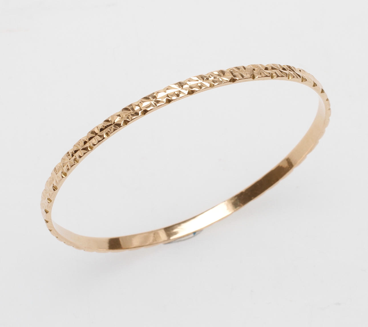 ARMRING, 18k guld, vikt ca 12 gr.
