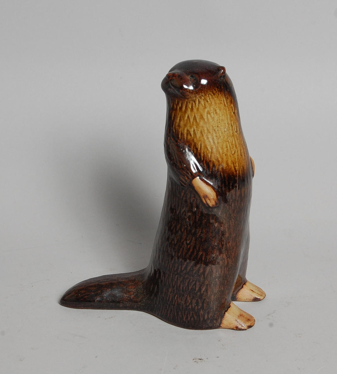 LISA LARSSON. figurin, stengods, " Utter ".