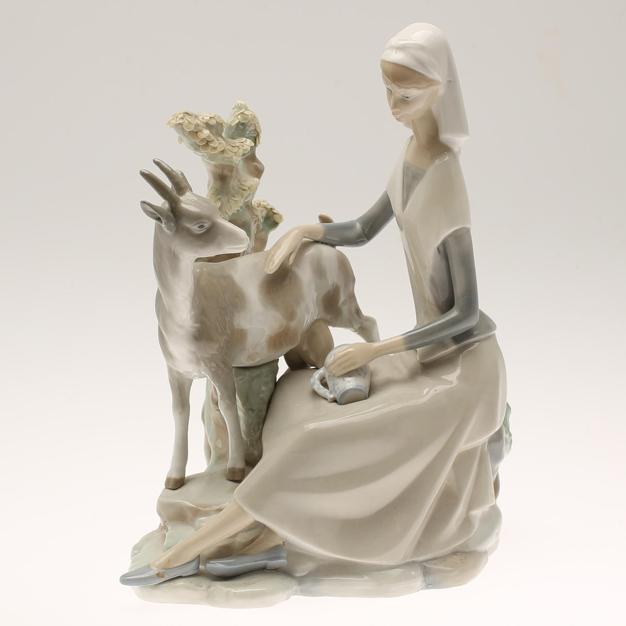 FIGURE, porcelain, marked Ladro.
