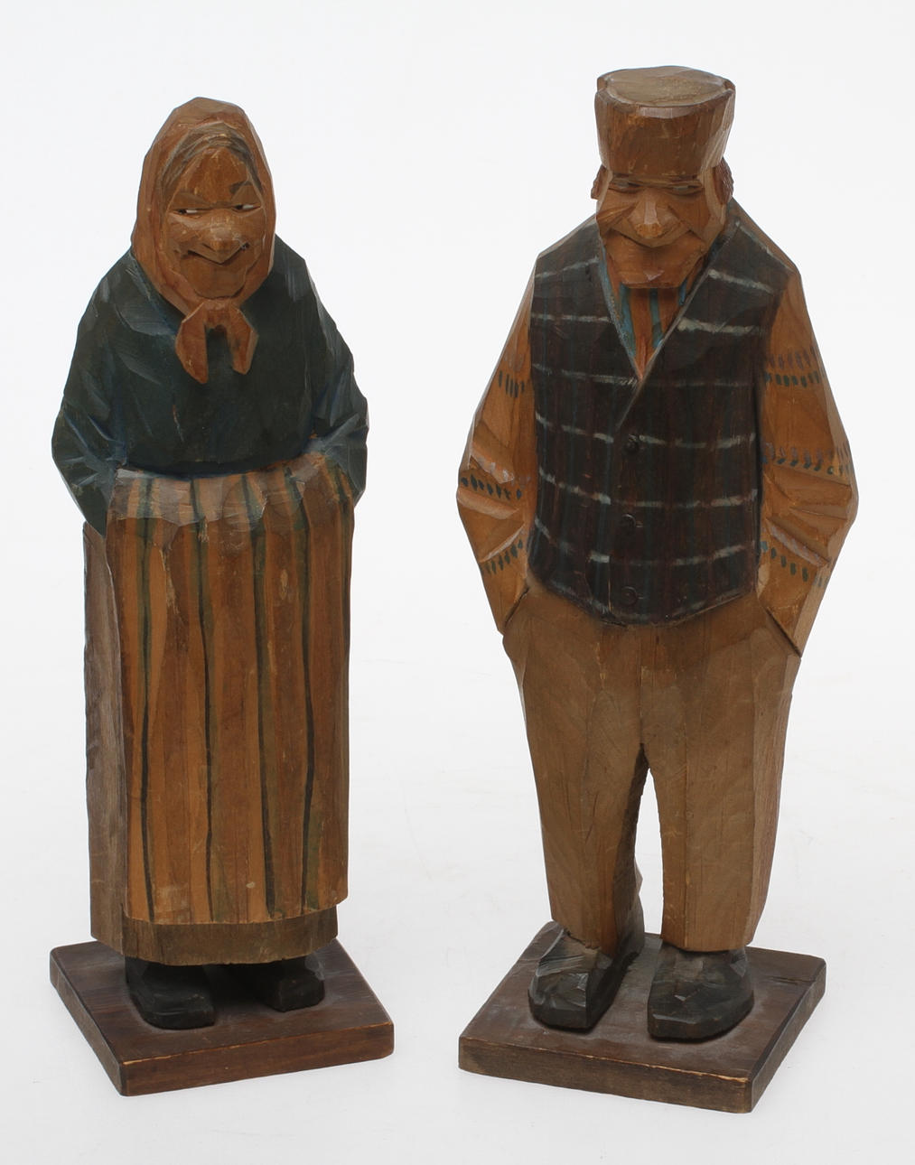 CARL JOHAN TRYGG. 2 st, figuriner, snidat trä, signerad och daterade 1926.