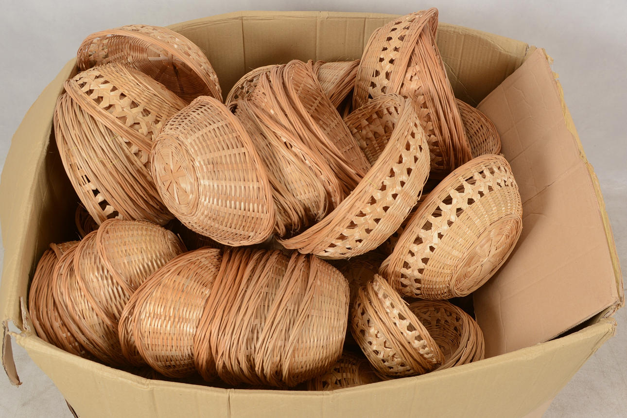 A BOX OF WITTLED BASKETS.