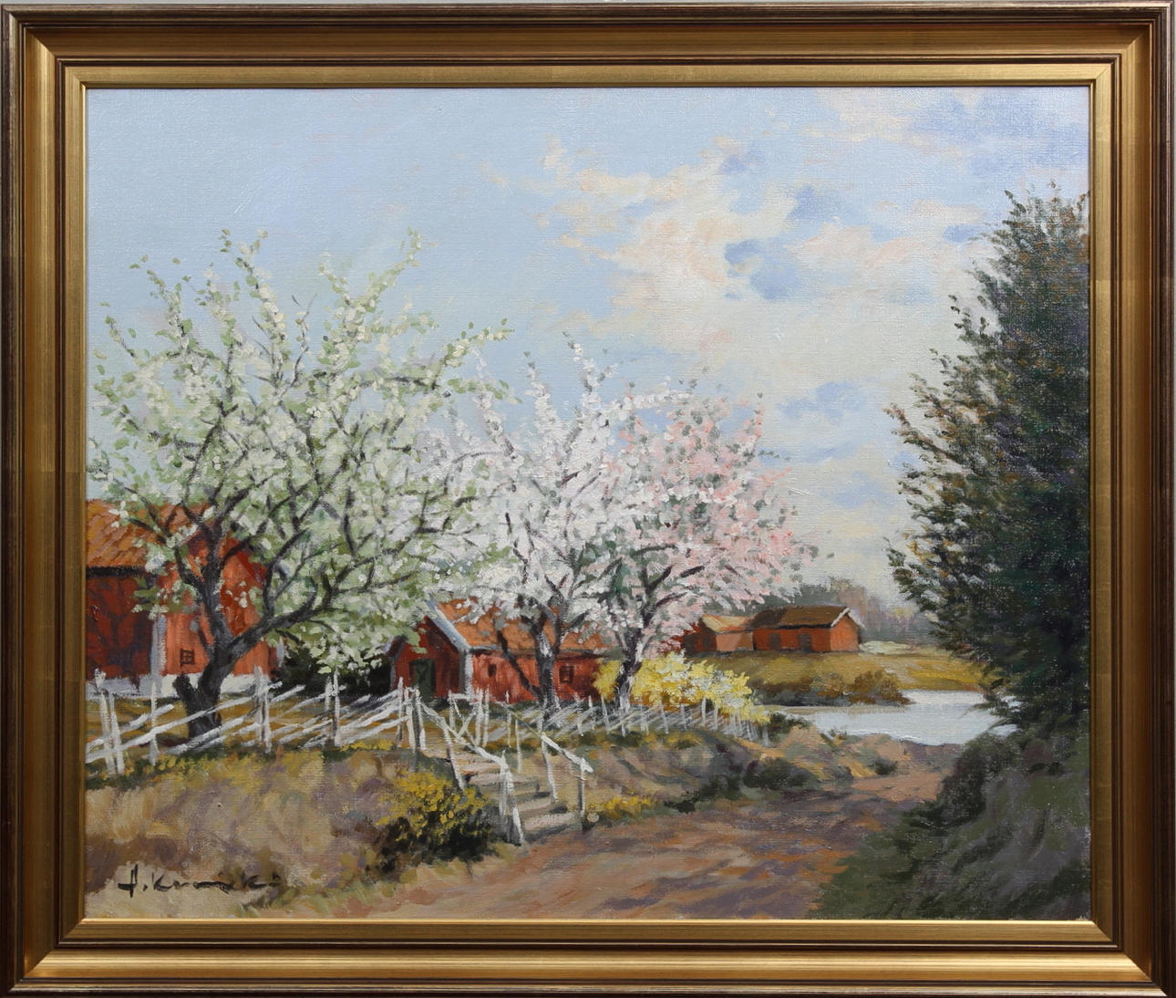 ALEXANDER KUNICKI. Lantgård med blommande fruktträd. Olja på duk. Signerad.