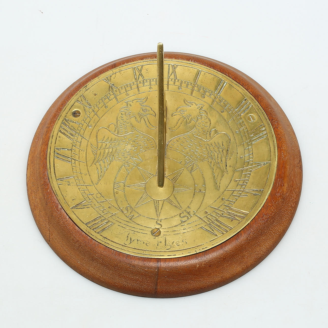 SUNCLOCK, brass and wood, 20th century.