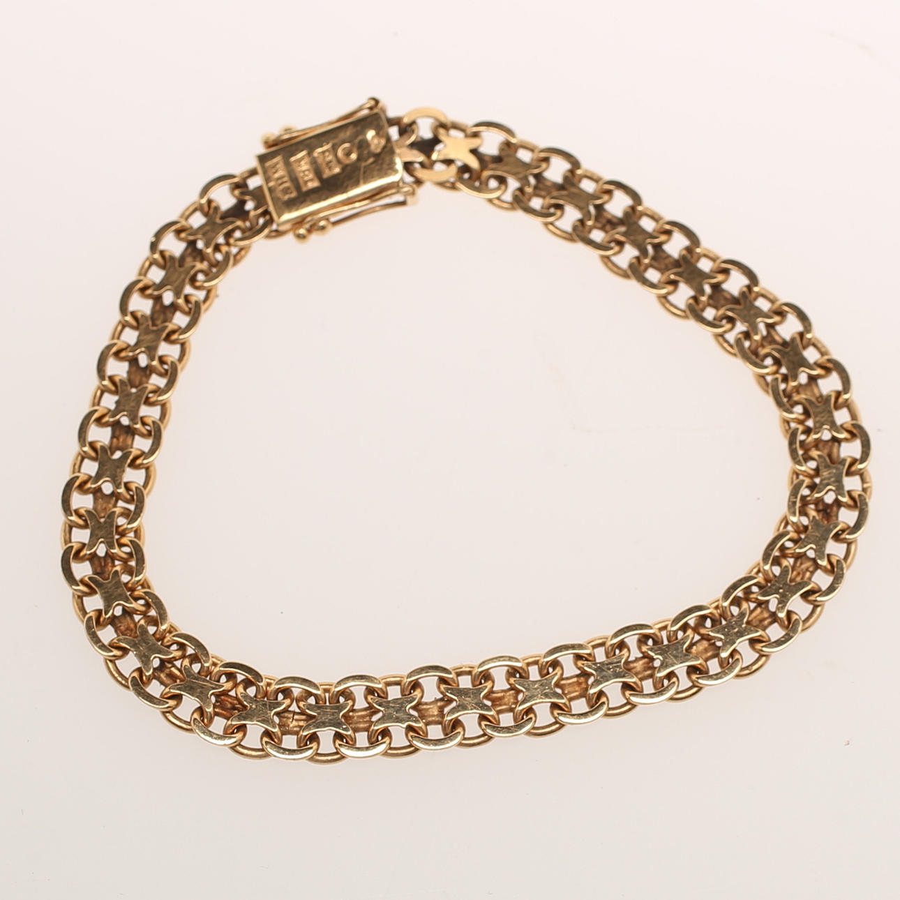 ARMBAND, 18 karat guld.