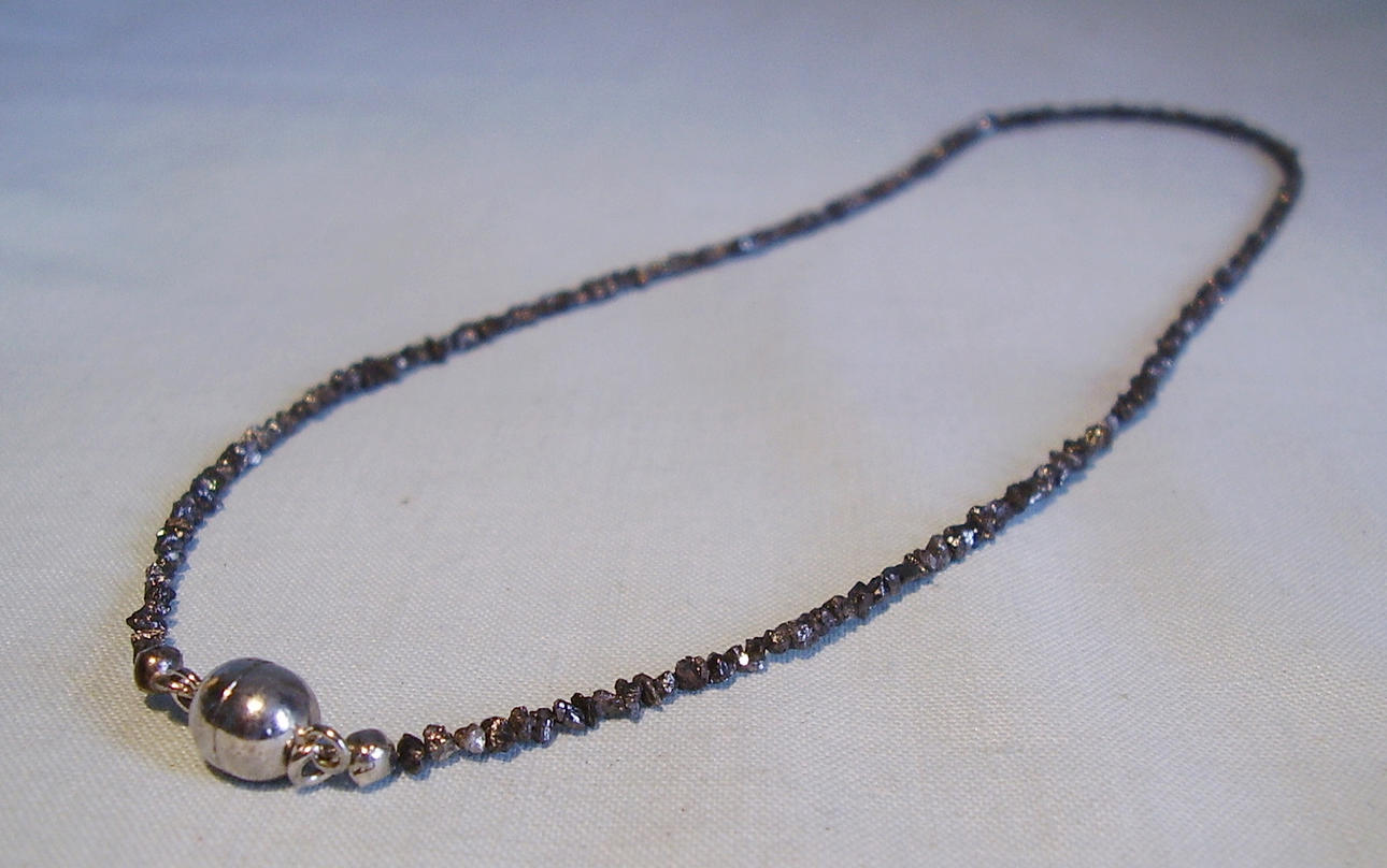 DIAMANT-KETTE, 18 ct., B. Conradt Idar-Oberstein.