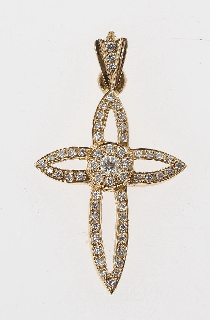 HÄNGE i form av kors, 18k guld med briljantslipade diamater om tot ca 0,76ct. Vikt ca 4,7 gram.