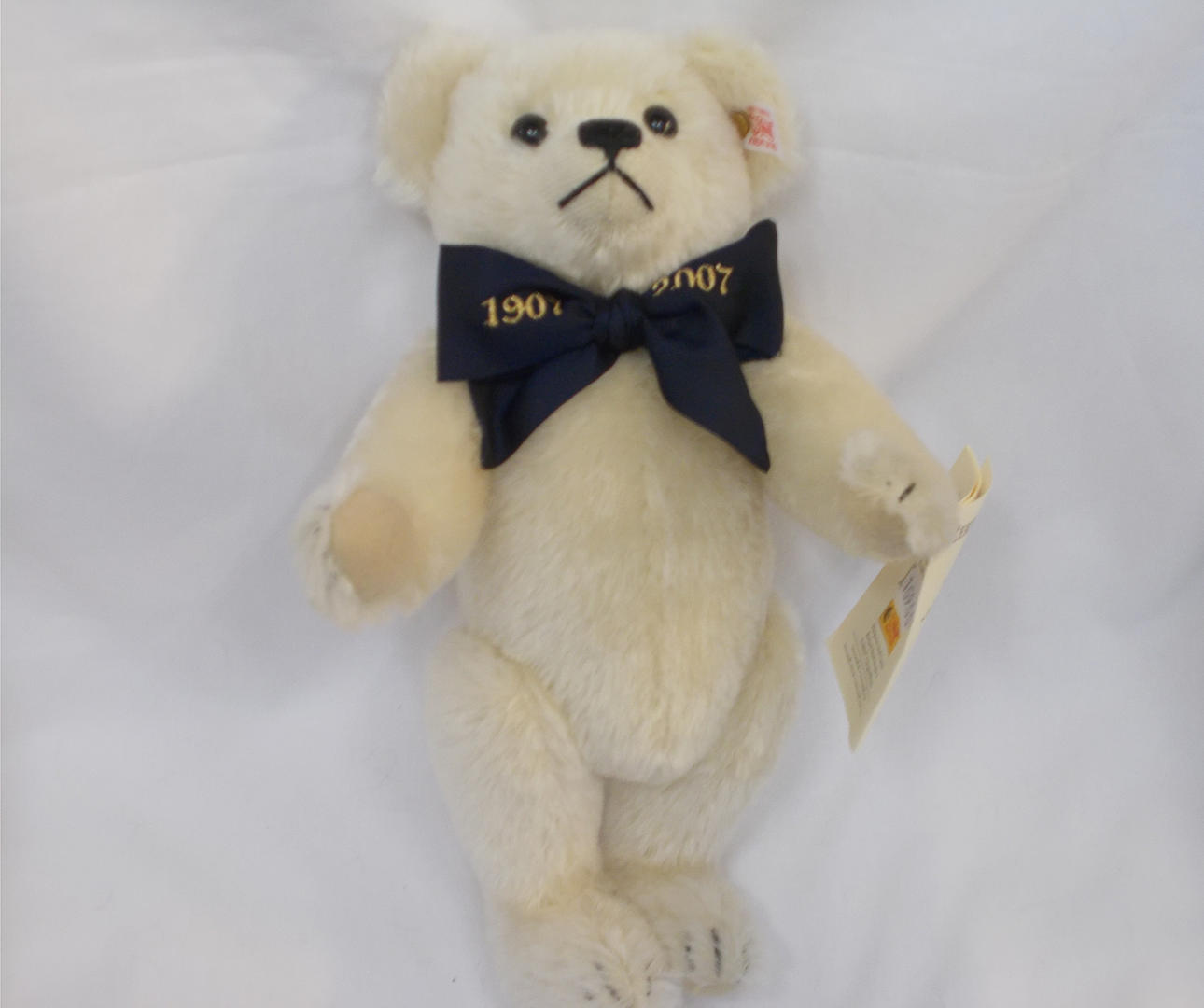 STEIFF BAMSE LYS MED sløjfe.