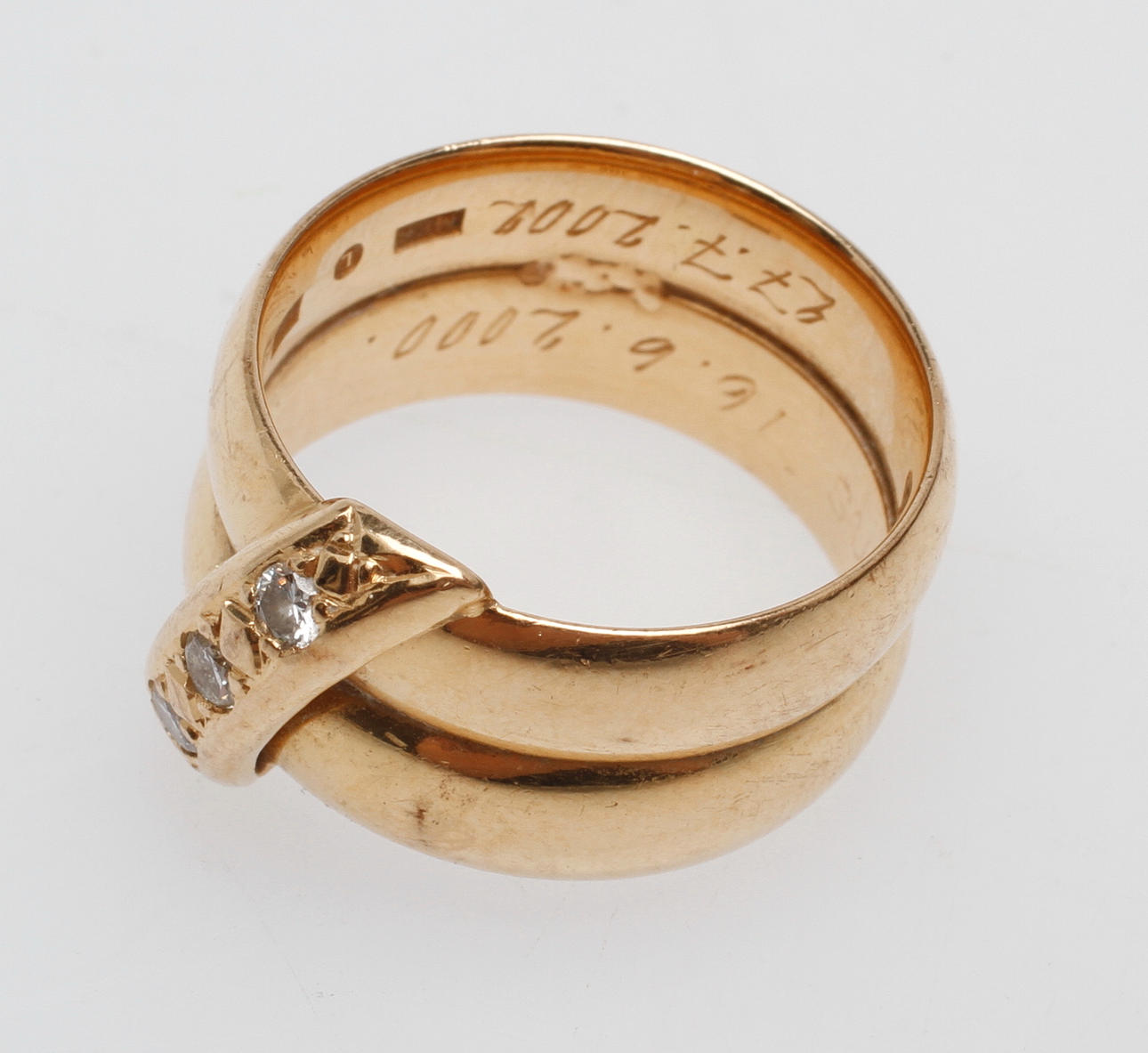 TVÅ SAMMANSATTA RINGAR, 18k guld, med diamanter, vikt ca 9,8 gr.