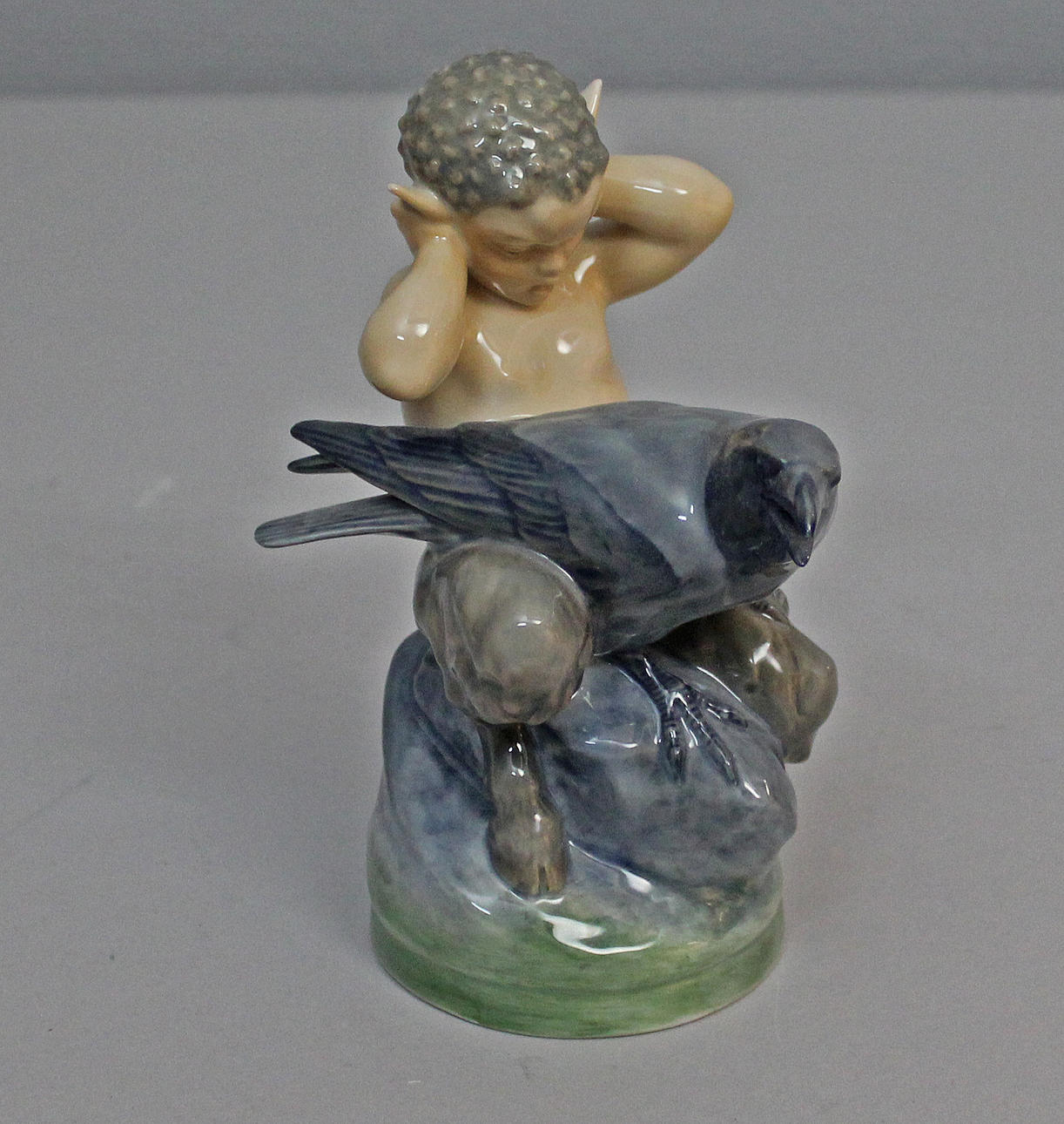FIGURIN, Faun med kråka, porslin, Royal Copenhagen, Danmark.