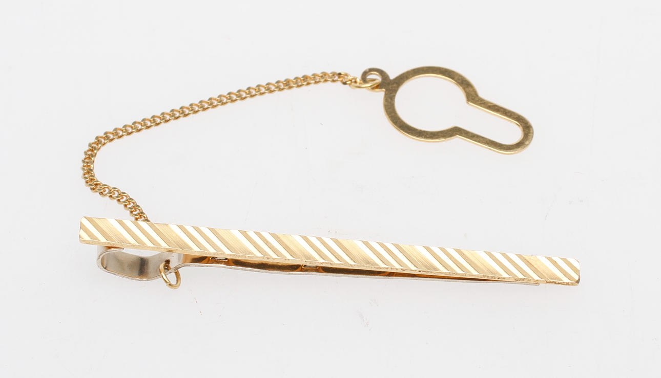 SLIPSNÅL, 18k guld, vikt ca 3,4 gr.