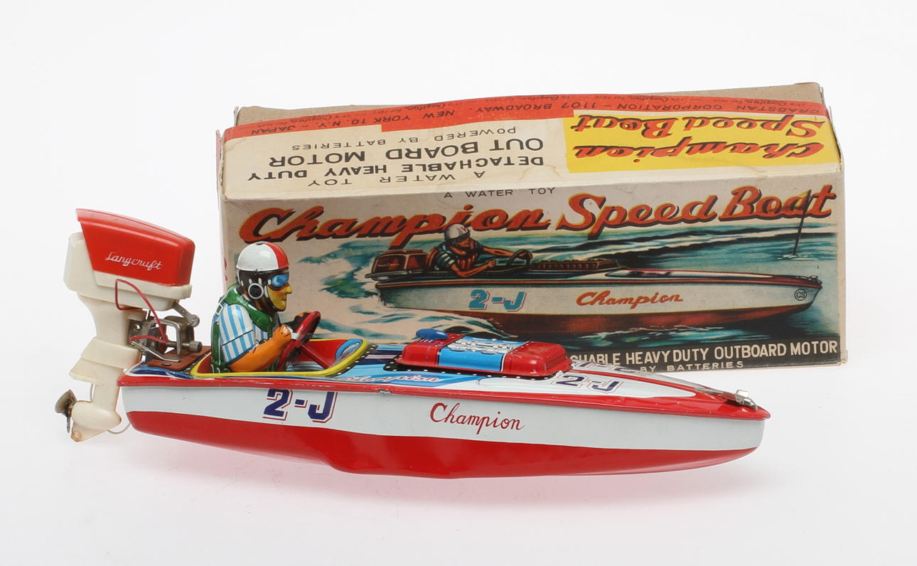 BÅT i plåt med utombordsmotor, Cragstan Japan. Originalkartong.
