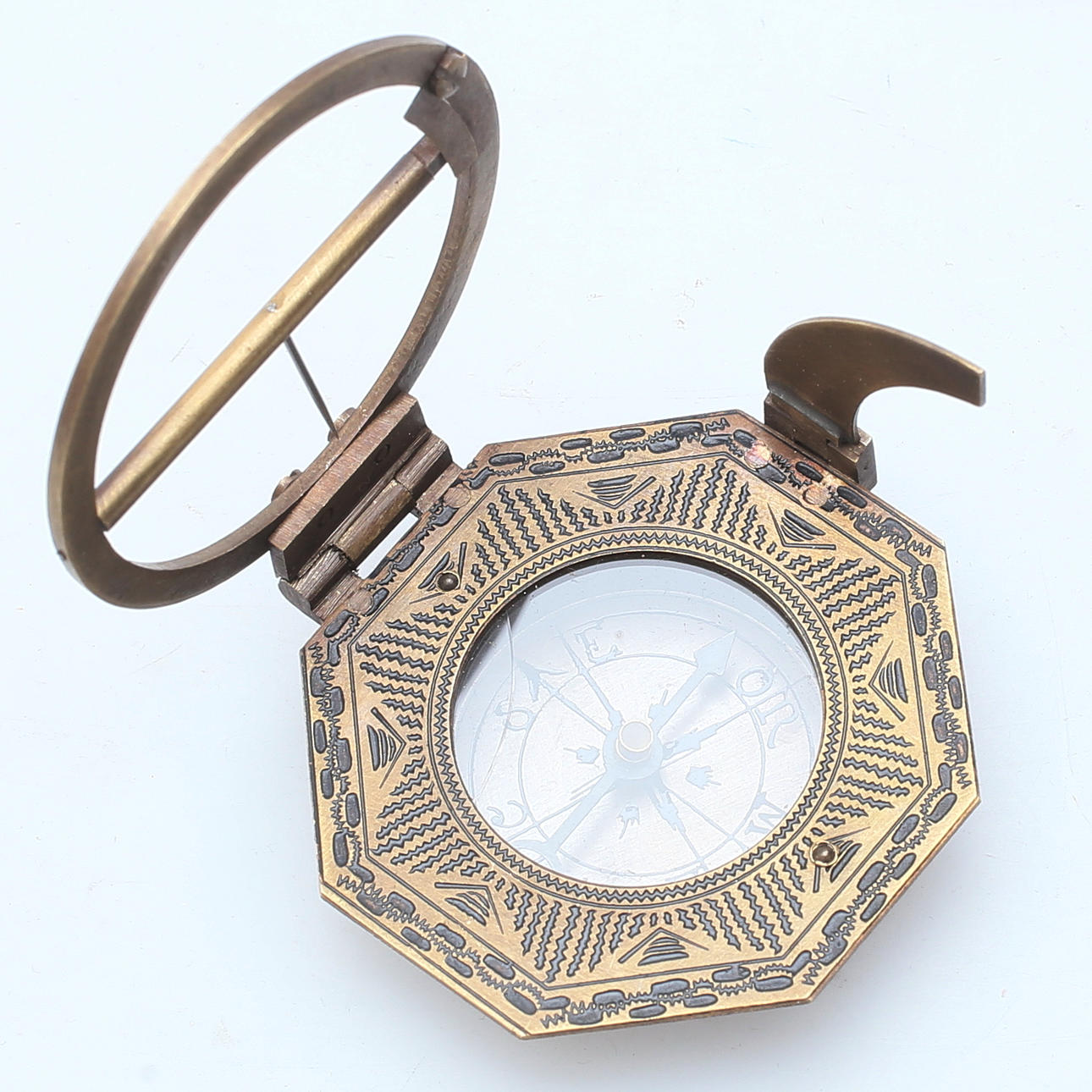 SOLUR/KOMPASS, metall, 1900-talets andra hälft.