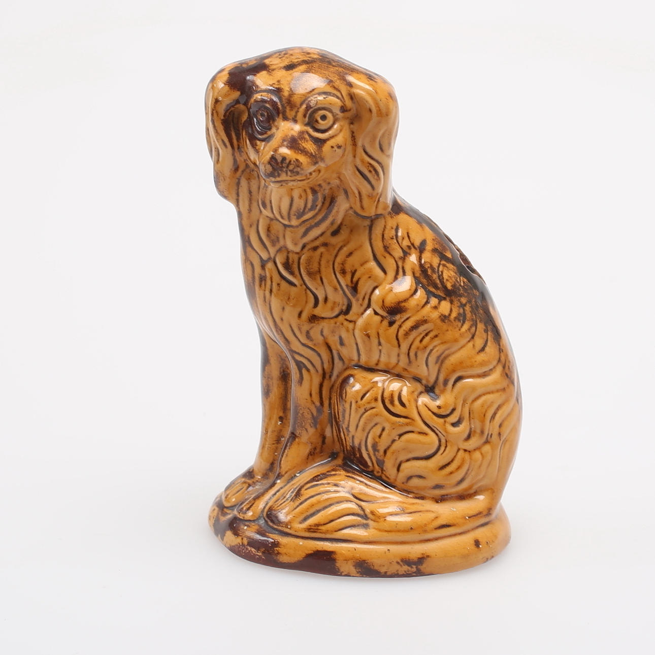 SPARBÖSSA, i form av hund, Tillinge.