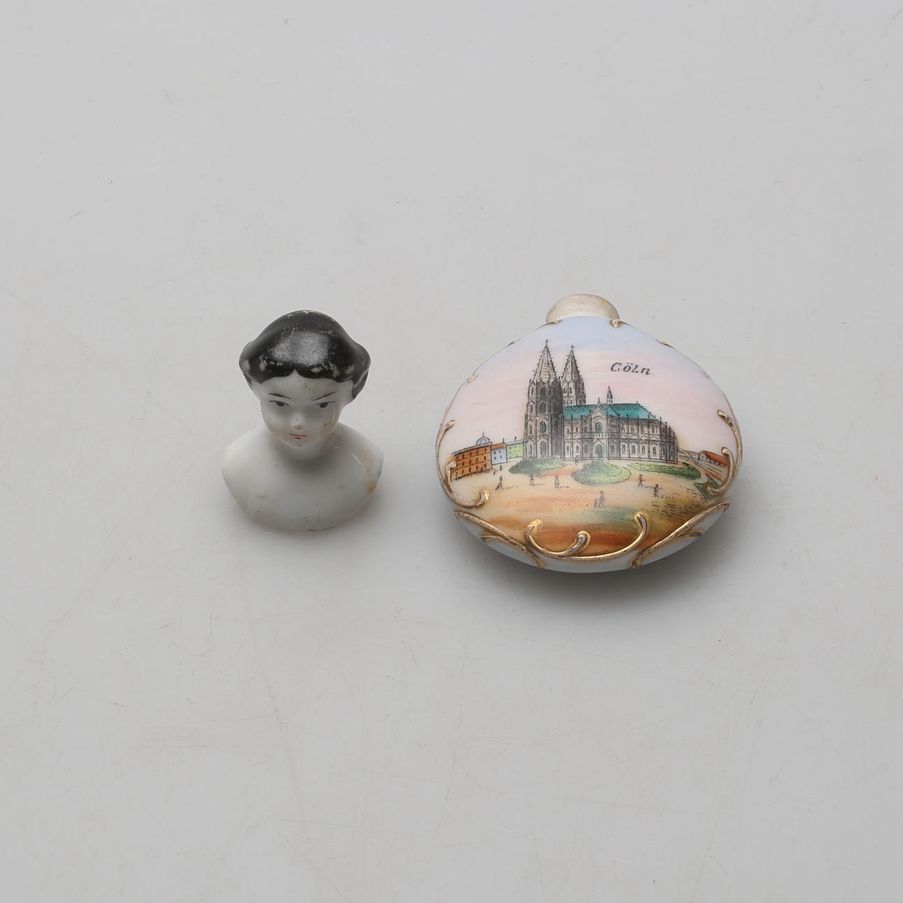 SNUFF BOTTLE, marked Cöln and DOLL HEAD.