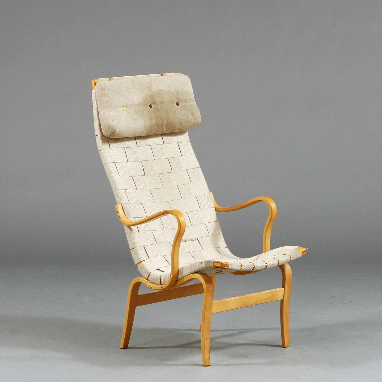 FÅTÖLJ "EVA", hög, med nackkudde. Bruno Mathsson för Dux.