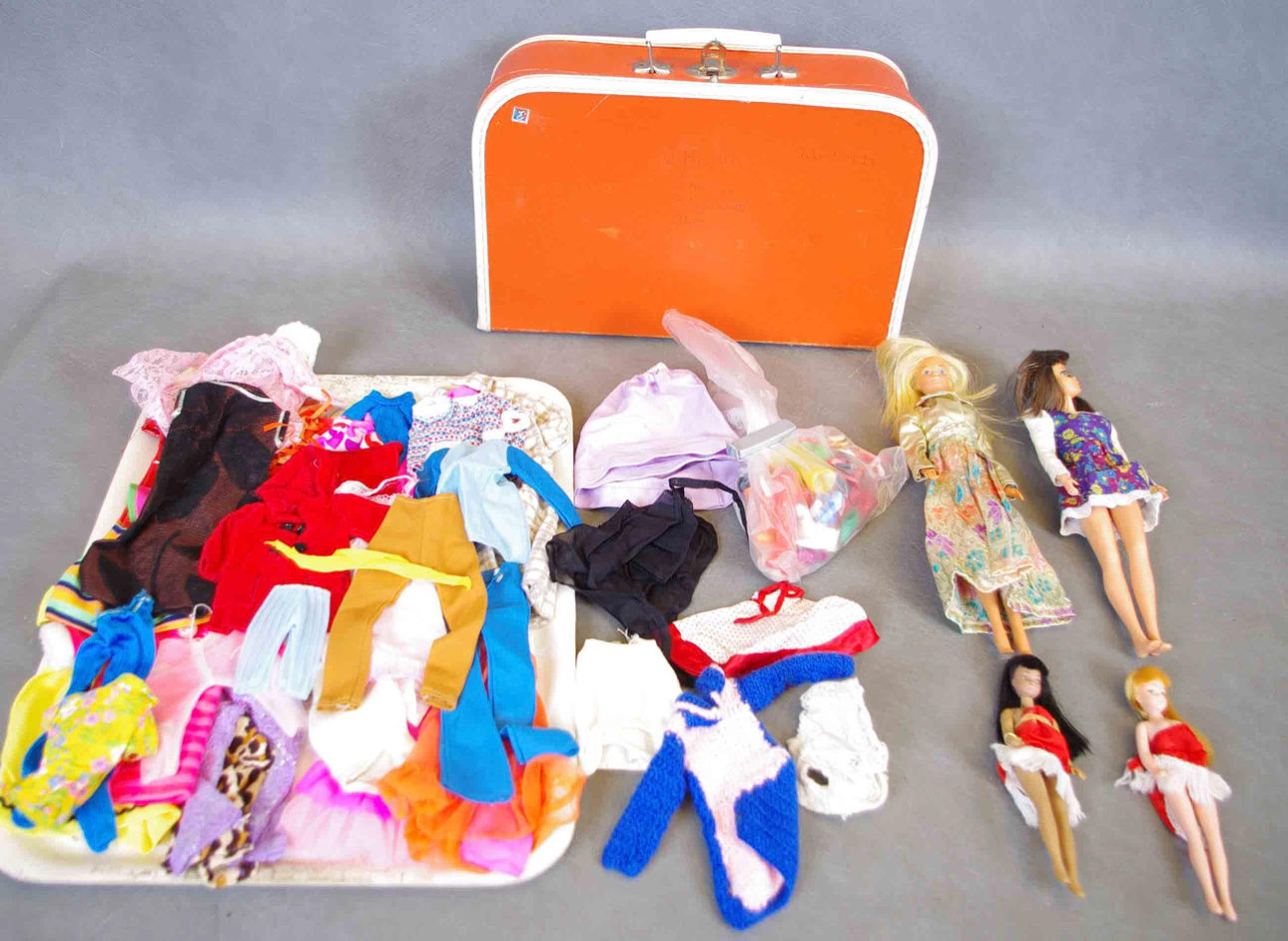 BARBIED DOLLS with clothes etc.