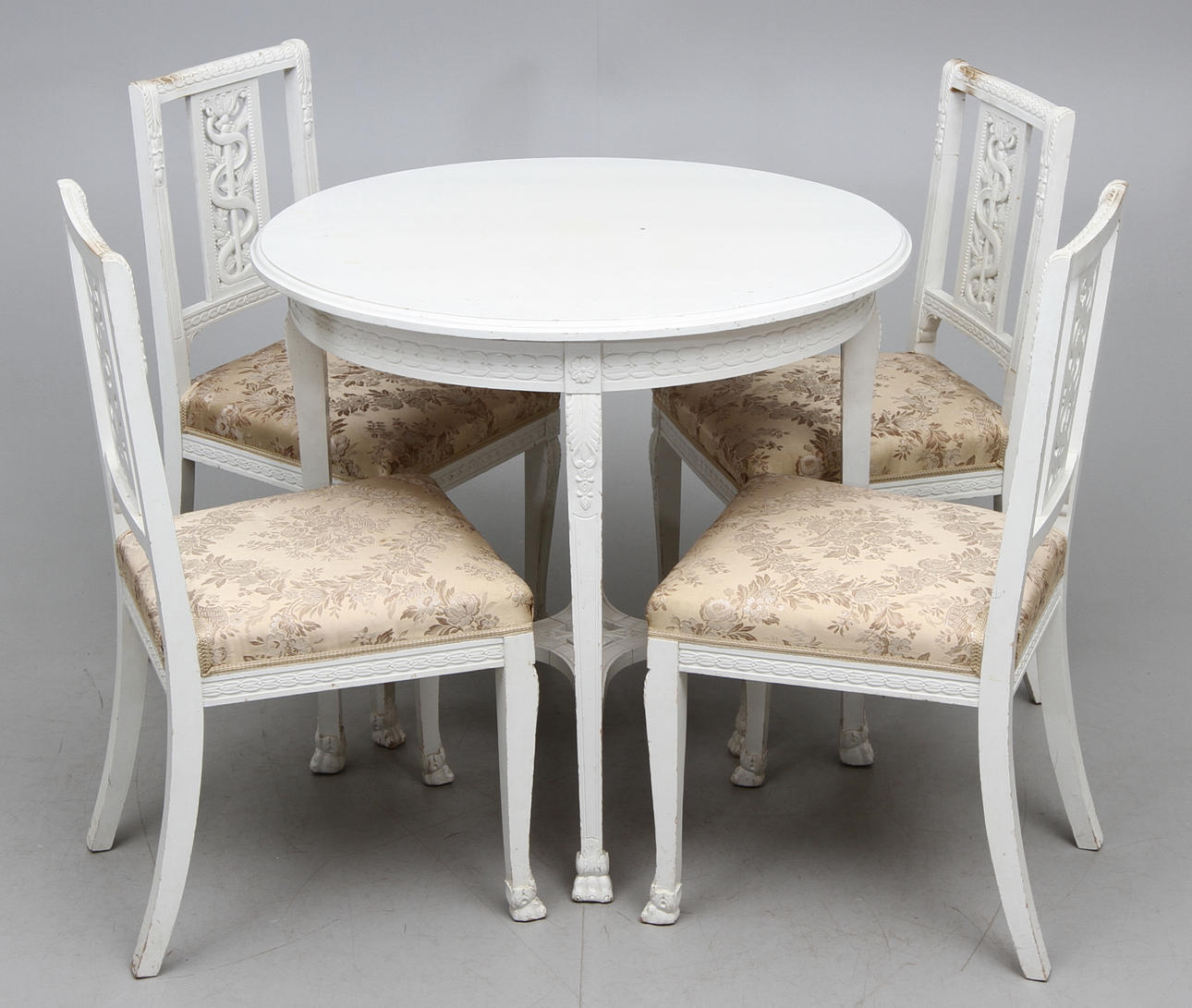 CHAIRS, 4 pcs, and table, Empire style, early 1900s.